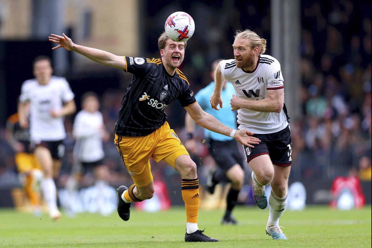 Leeds United’s Patrick Bamford, left, and Fulham’s Tim Ream battle for the ball during the English Premier League soccer match between Fulham and Leeds United at Craven Cottage, London.