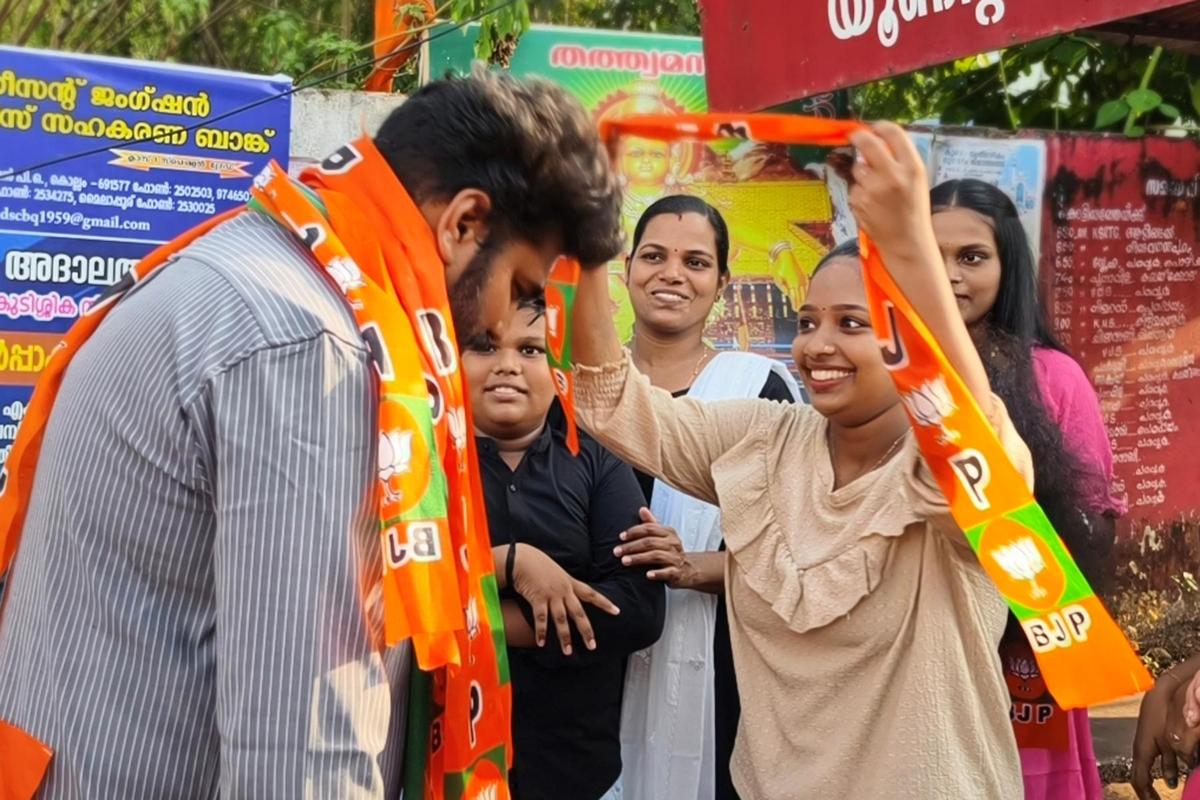 NDA candidate Robin Radhakrishnan during an election campaign in Kundara Assembly constituency in Kollam on Saturday.