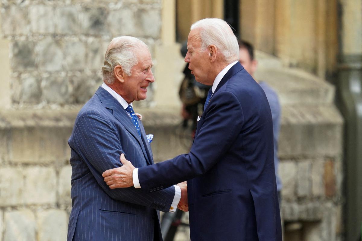 U.S. President Joe Biden is welcomed by Britain’s King Charles at Windsor Castle in Windsor, Britain, July 10, 2023. 