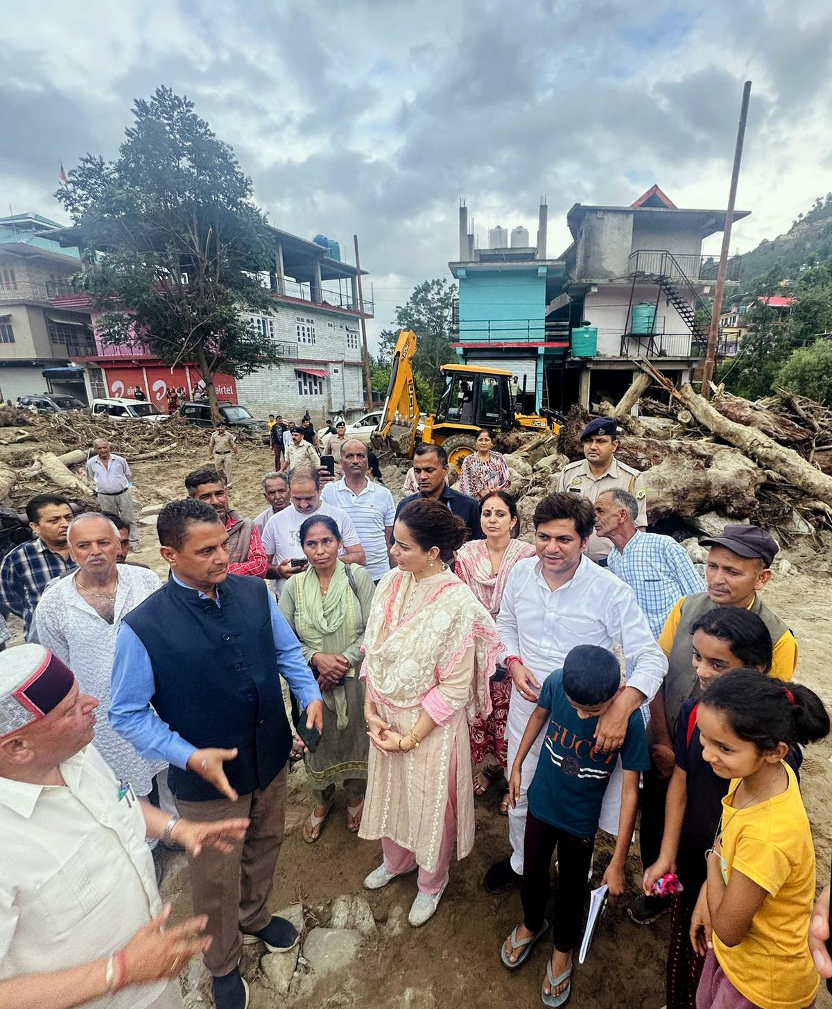BJP MP Kangana Ranaut interacts with people during her visit to areas affected by disaster following heavy downpour, at Karsog in Mandi on July 6, 2025. Photo: X/@KanganaTeam via ANI