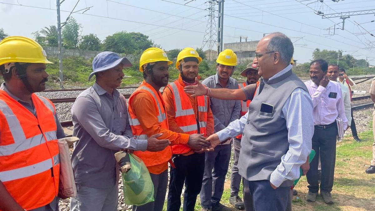 Senior South Western Railway officer inspects railway development works