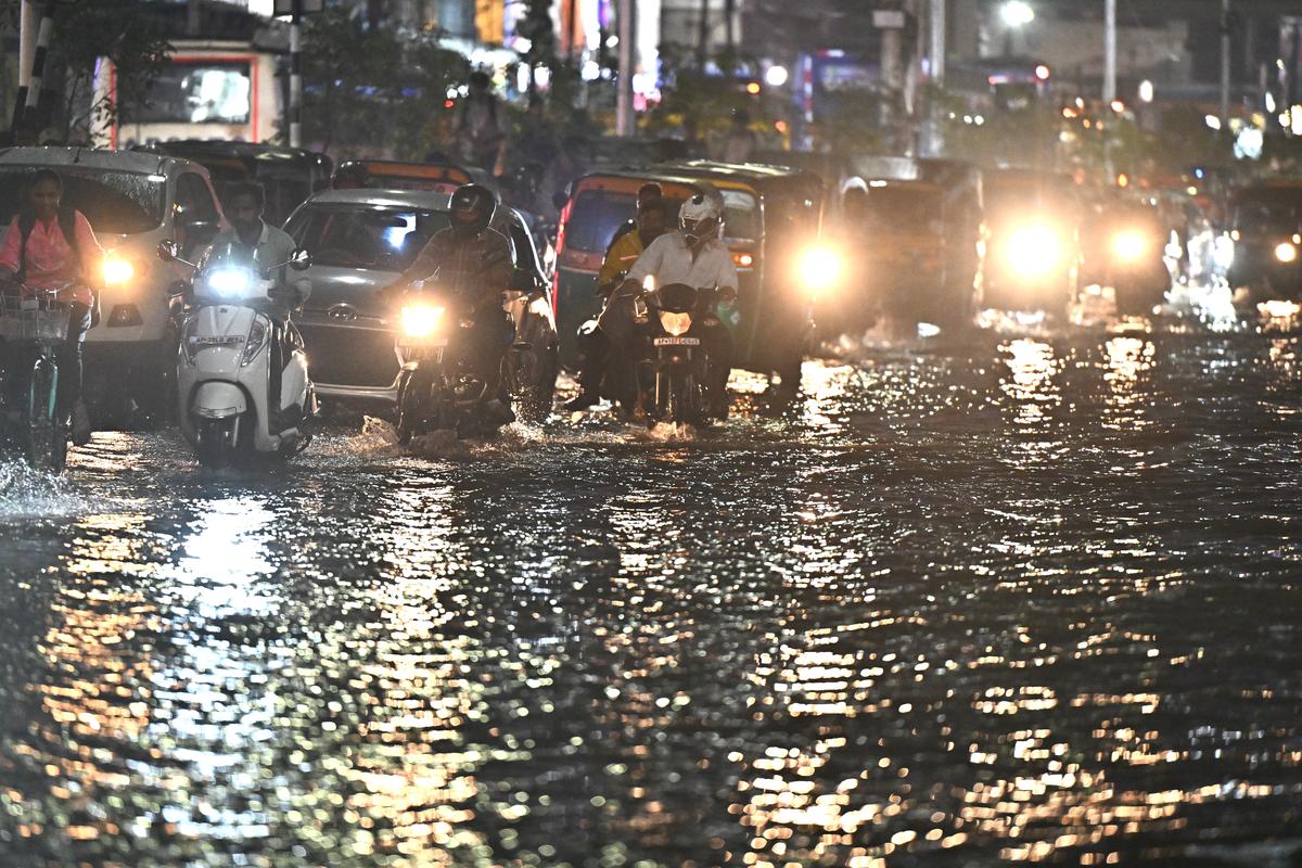 An hour of heavy rain left the city roads caused waterlogging, leading to traffic snarls in Vijayawada on Wednesday.. 