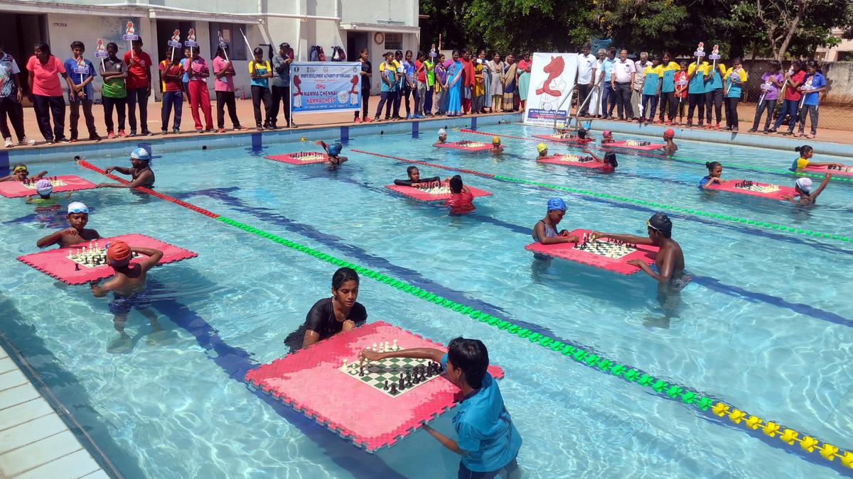 Students play chess in swimming pool The Hindu
