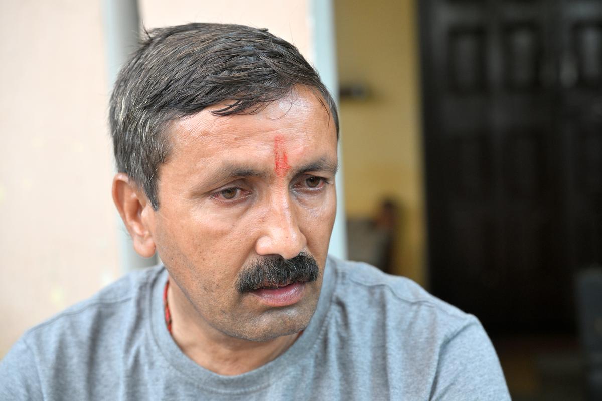 Nikki Bhati’s father, Bhikari Payla, at his house in Roopwas village. 