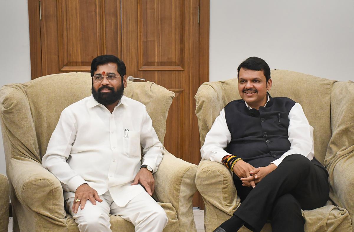 Rebel Shiv Sena leader Eknath Shinde (left) at the residence of the Leader of the Opposition Devendra Fadnavis in Mumbai on June 30.