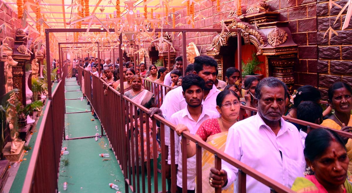 Devotees visit Sri Mahalaxmi Godha Sametha Virat Venkateshwara Swami Temple Vaikuntapuram on the occasion of Vaikuntha Ekadashi in Sangareddy on Friday.