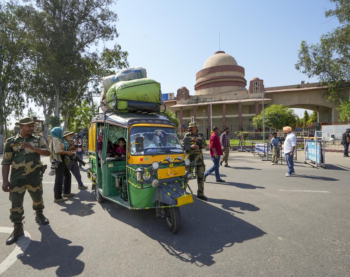 Security personnel keep vigil as Pakistani nationals arrive at the Integrated Check Post at Attari-Wagah border to move to their country, nnear Amritsar on April 27, 2025. Security personnel keep vigil as Pakistani nationals arrive at the Integrated Check Post at Attari-Wagah border to move to their country, nnear Amritsar on April 27, 2025.