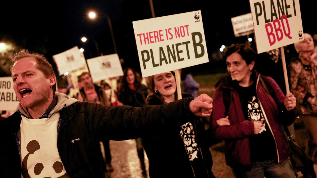 Hundreds protest at U.N. climate summit; Germany voices concerns