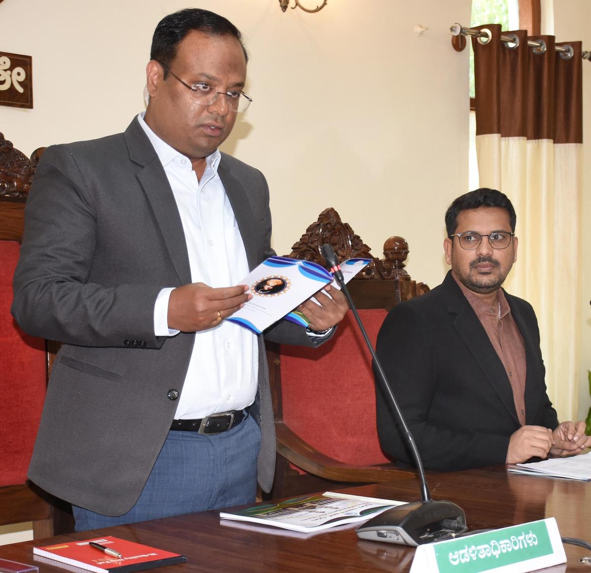 Regional Commissioner and MCC administrator Nitesh Patil presenting the Mysuru City Corporations 2026-27 budget on Wednesday. MCC Commissioner Sheikh Tanveer Asif was present.