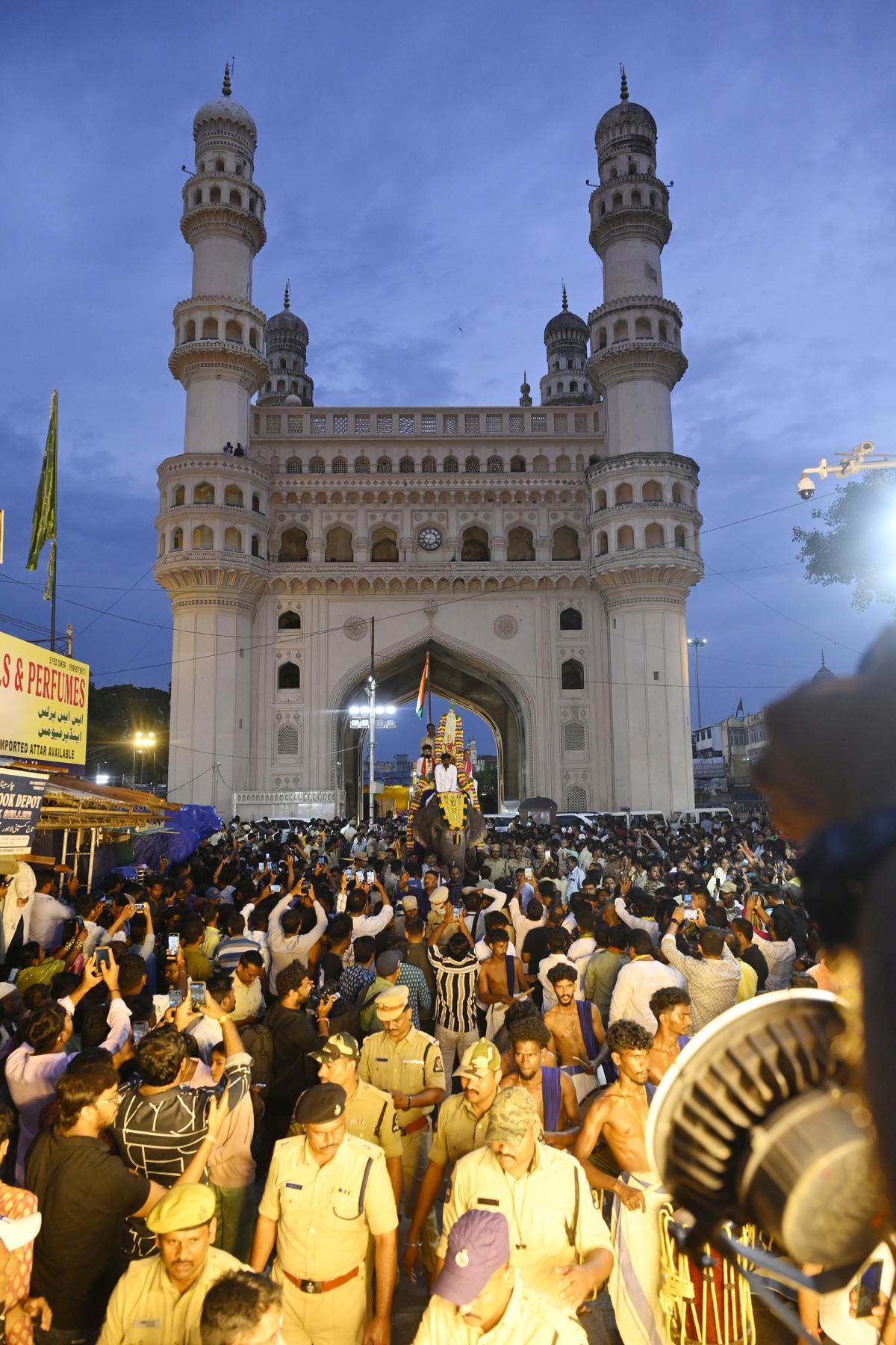 A caparisoned elephant with the photo of goddess Mahakali being taken out as part of the Bonalu festival in Old City of hyderabad on Monday.