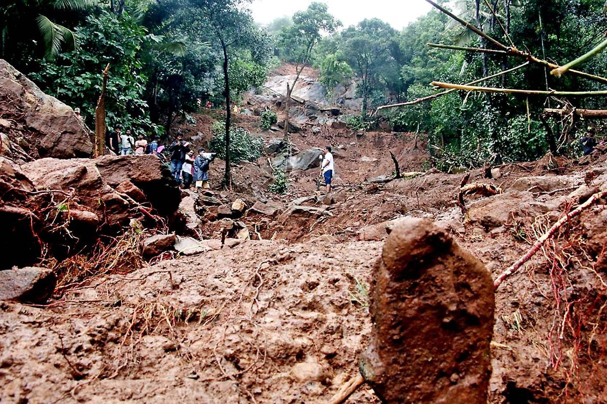 A view of the landslides following the heavy rain at Thodiel near Paravoor in Kannur on Tuesday three  people died