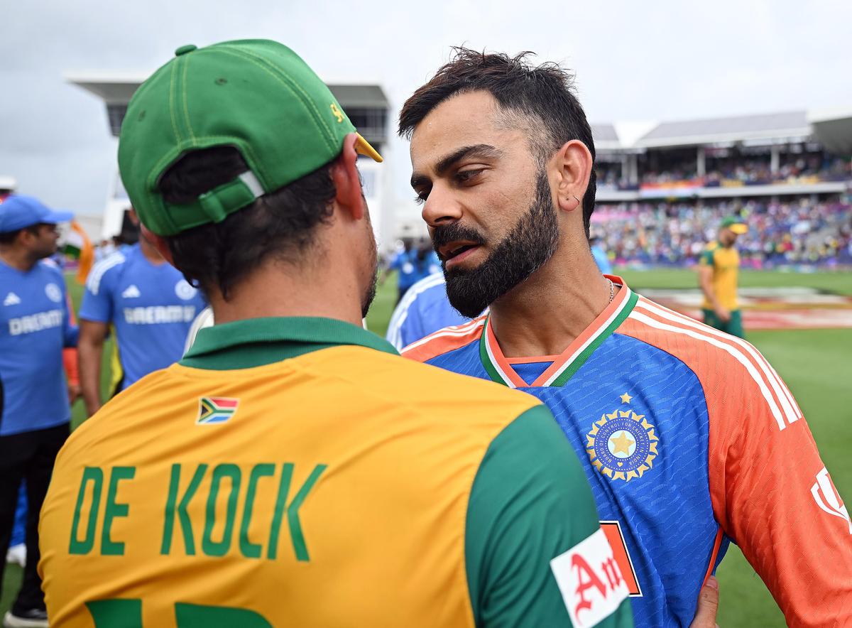 Virat Kohli and South Africa’s Quinton de Kock greet each other after their ICC Mens T20 World Cup 2024 final match, at Kensington Oval in Barbados.
