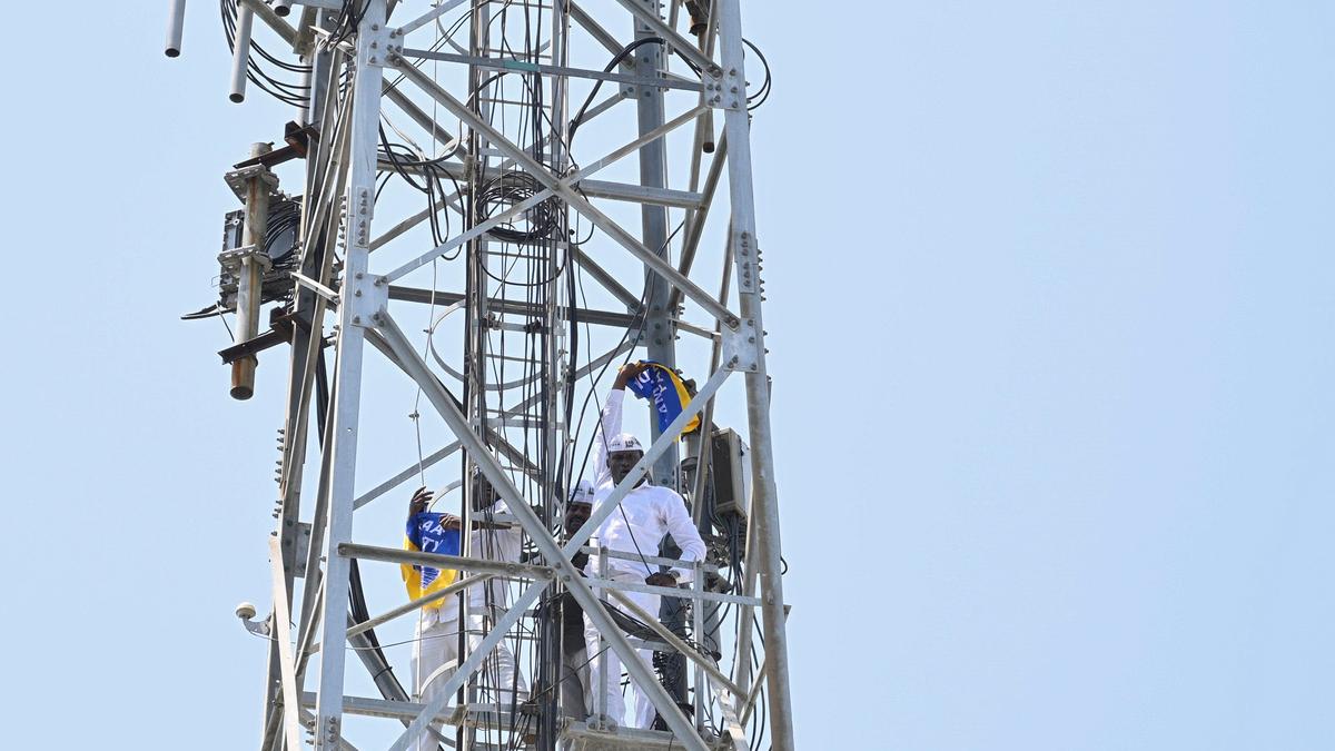 AAP functionaries climb up cell tower in protest against Kejriwal’s arrest