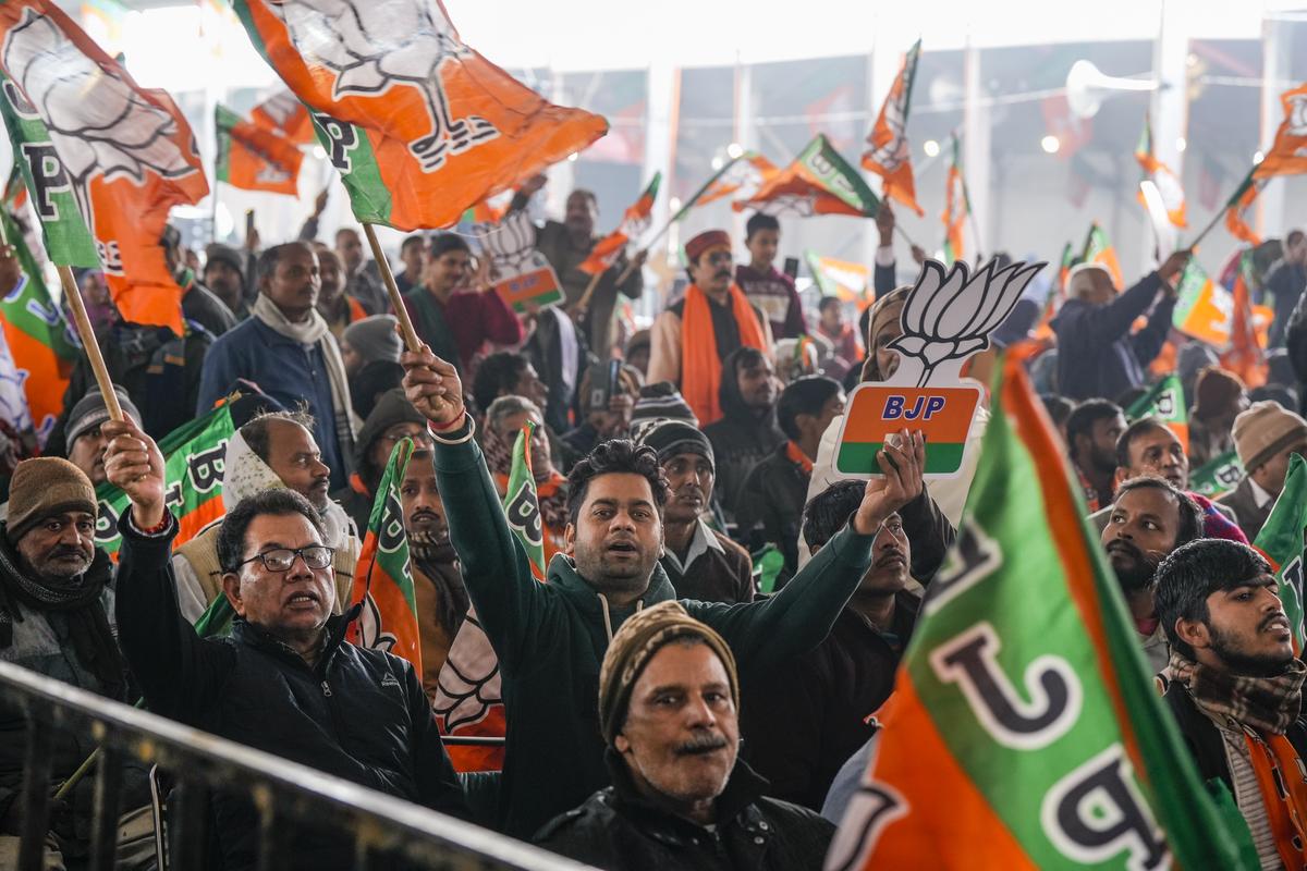 Supporters during a rally addressed by Prime Minister Narendra Modi at Rohini area, ahead of the Delhi Assembly elections in New Delhi on January 5, 2025. Supporters during a rally addressed by Prime Minister Narendra Modi at Rohini area, ahead of the Delhi Assembly elections in New Delhi on January 5, 2025.