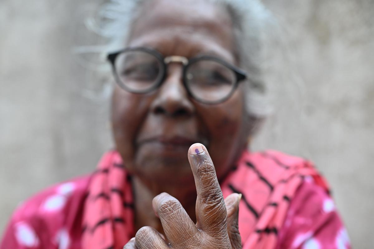 Kamala N.S., 78, a senior citizen from Varkala after casting her vote at a polling booth in Perumkulam (Varkala municipality), during the first phase of local body elections in Thiruvananthapuram on Tuesday.
