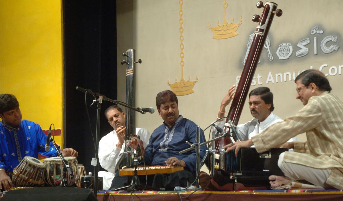  Ustad Rashid Khan with Subhankar Banerjee on the tabla and Jyoti Goho on the harmonium performing at the Music Academy in Chennai on December 31, 2007.