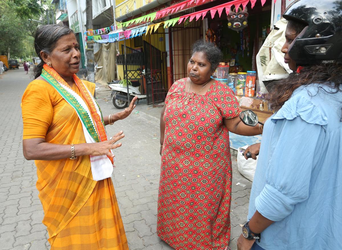 UDF candidate Nirmala Teacher campaigning in Gandhi Nagar division ahead of the local body elections.