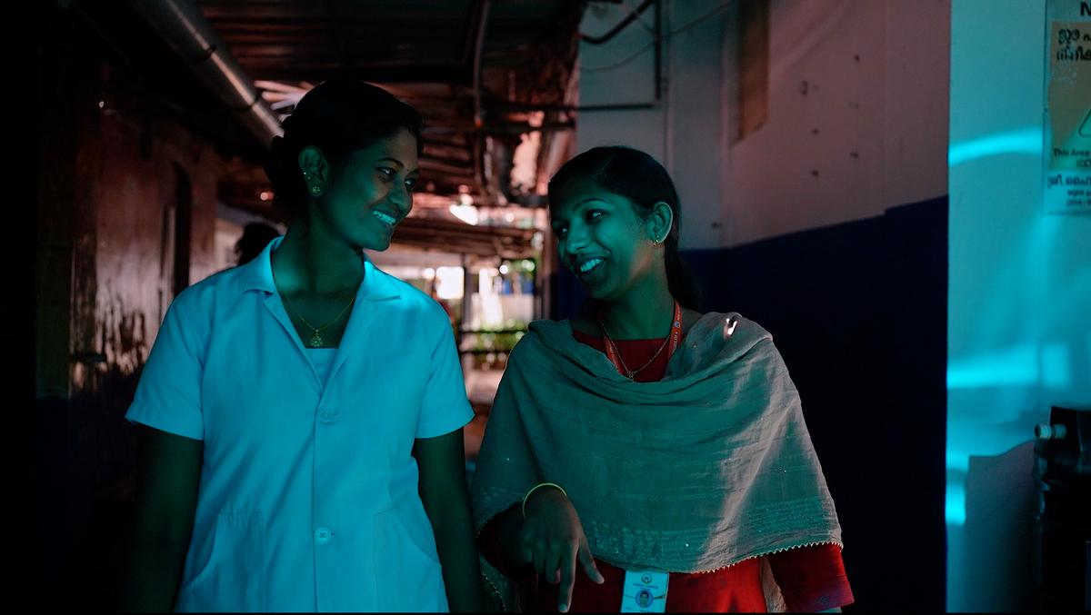 Hanna Sarah Prince (right) with Aswathy M, nurse at the human milk bank, in a still from the documentary Hanna directed by Vinu Janardanan