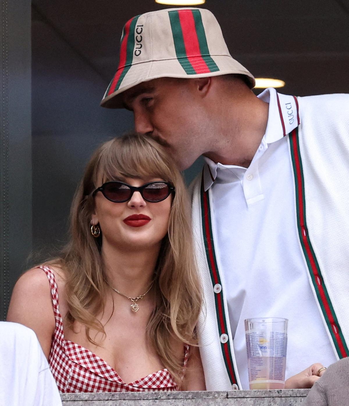 FILE PHOTO: Tennis - U.S. Open - Flushing Meadows, New York, United States - September 8, 2024 Singer Taylor Swift and Kansas City Chiefs' Travis Kelce are seen ahead of the men's final match between Italy's Jannik Sinner and Taylor Fritz of the U.S. REUTERS/Mike Segar/File Photo