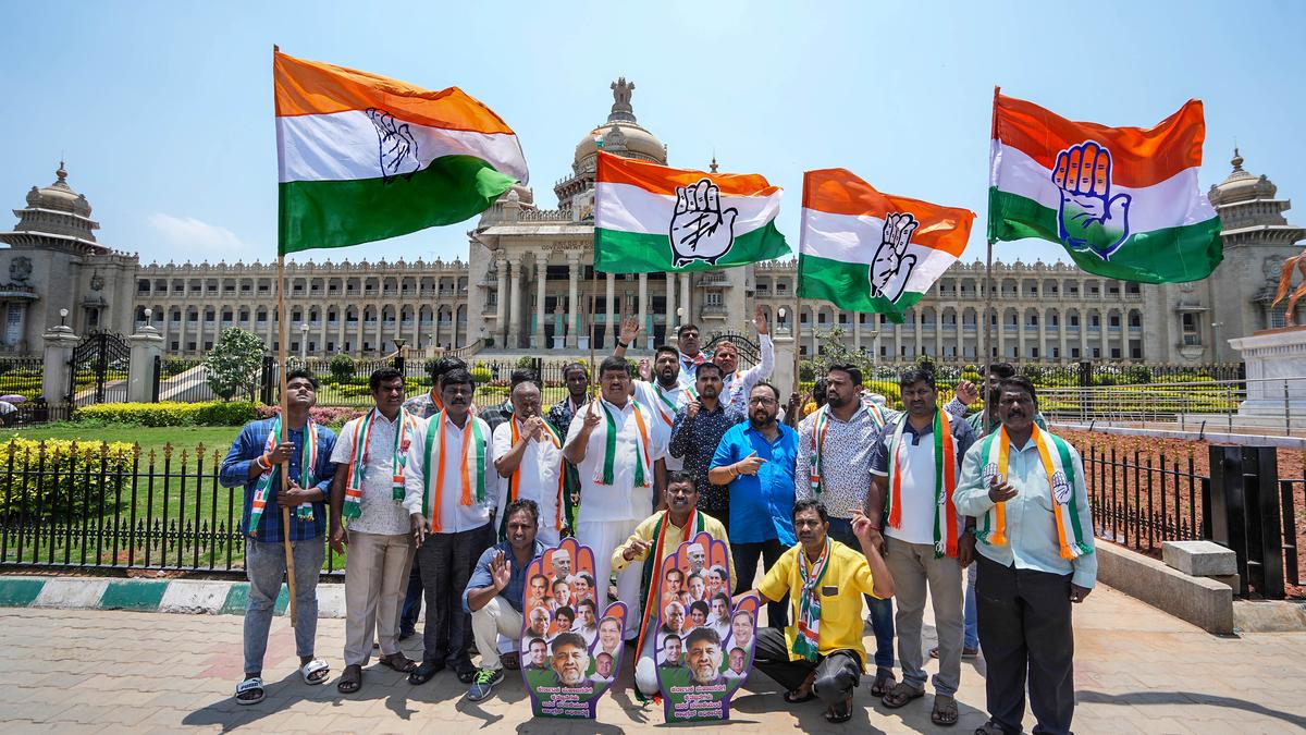 Congress workers perform rituals with cow urine at Vidhana Soudha symbolising washing away ‘corrupt BJP government’