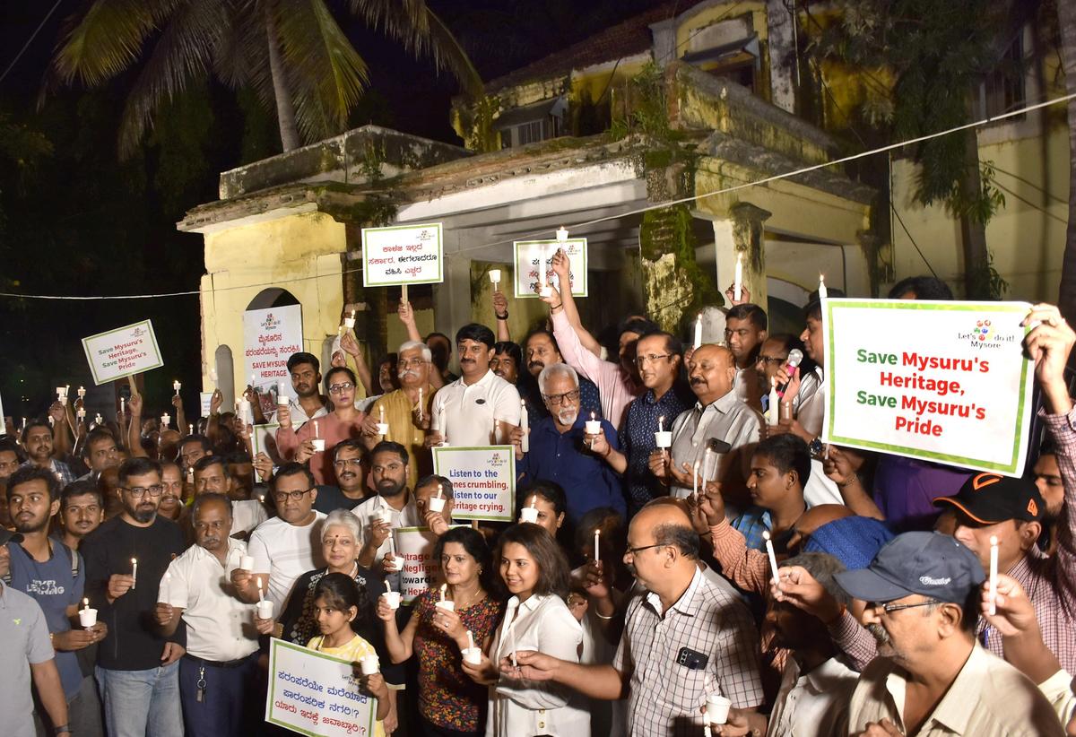 Candle light protest held to conserve heritage buildings in Mysuru