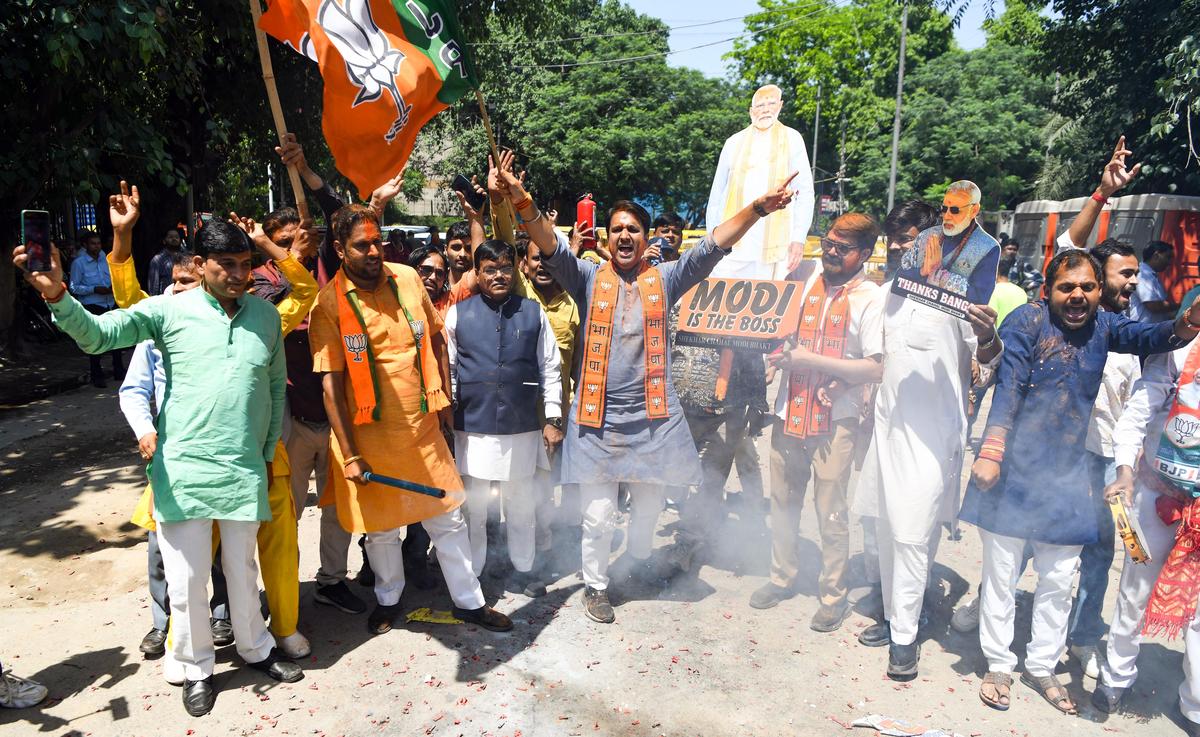 BJP workers celebrate as NDA maintains lead in Assam