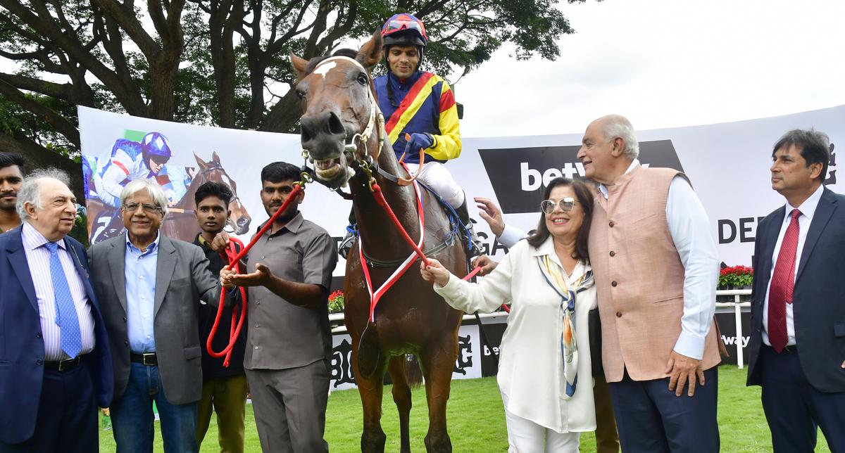 A.S. Narielwala, owners D.R. Thacker, Anita J. Captain, K.N. Dhunjibhoy, and trainer P. Shroff leading in Jamari after her win in the Betway Bangalore Summer Derby at Bangalore Turf Club (BTC) in Bengaluru on July 16, 2023.