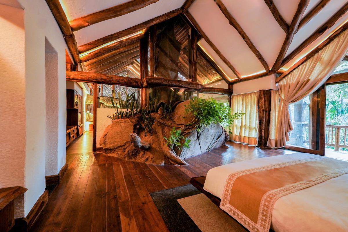 One of Estate Paathiri’s key highlights is the bedroom where a rock found on-site has been incorporated.                   