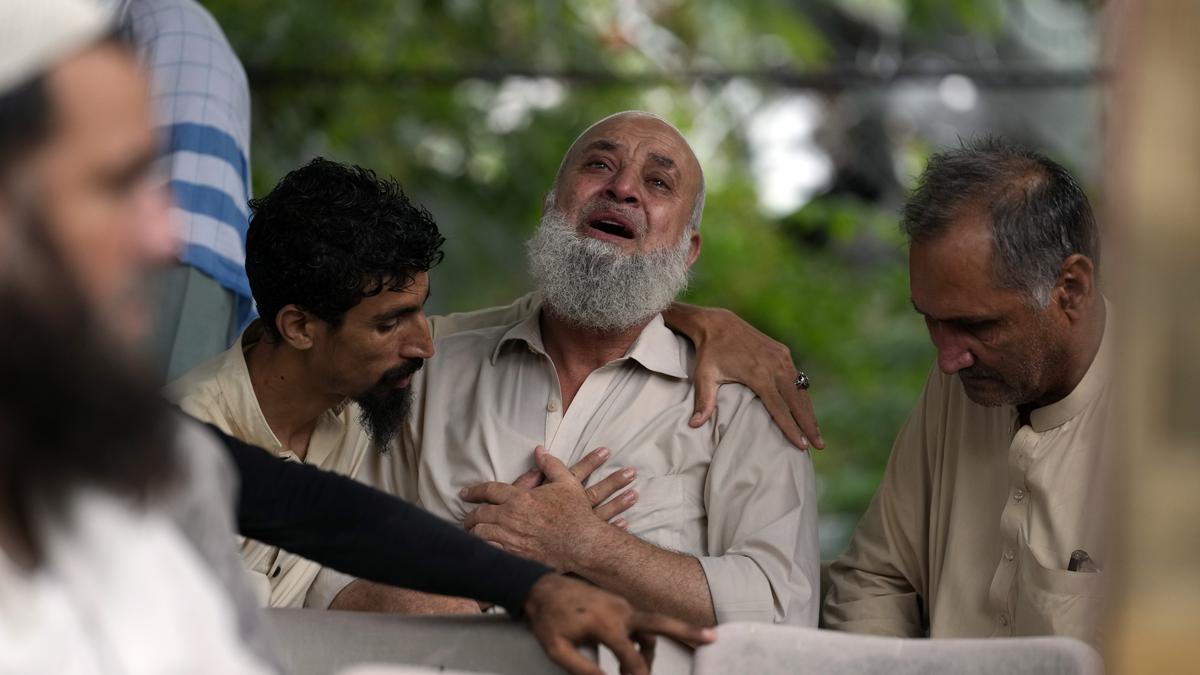 11 dead after a wall collapses near an under-construction bridge in Pakistan during monsoon rains