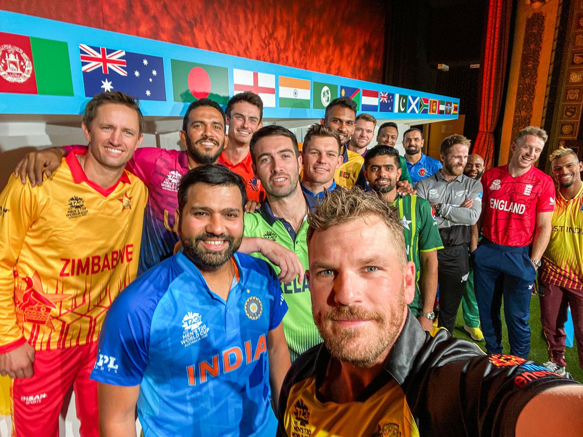 Australian cricket team captain Aaron Finch clicks a selfie with captains of the cricket teams of other participating nations during the ‘Captains Day’ programme, a day before the start of the ICC Men’s T20 World Cup 2022, in Australia. 
