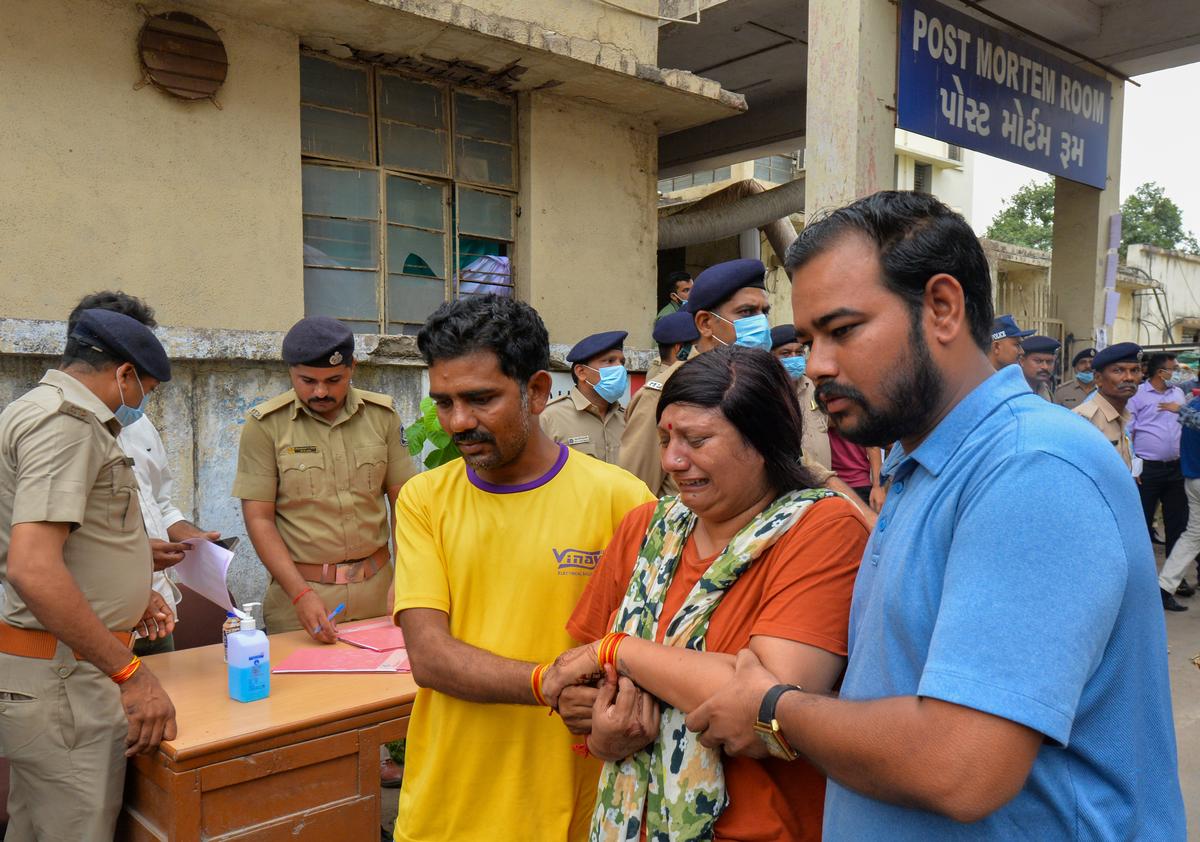 Relatives of the victims at the Civil Hospital, Ahmedabad.