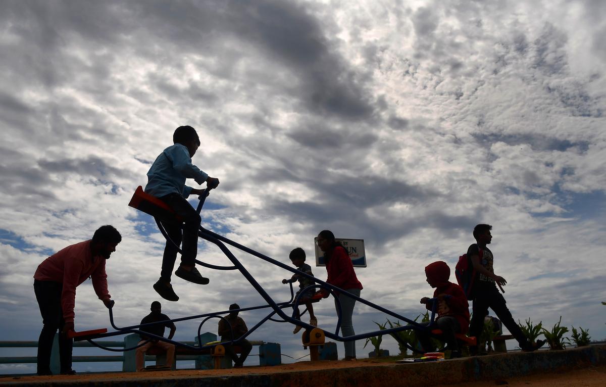 Children playing in a park on Visakhapatnam beach.