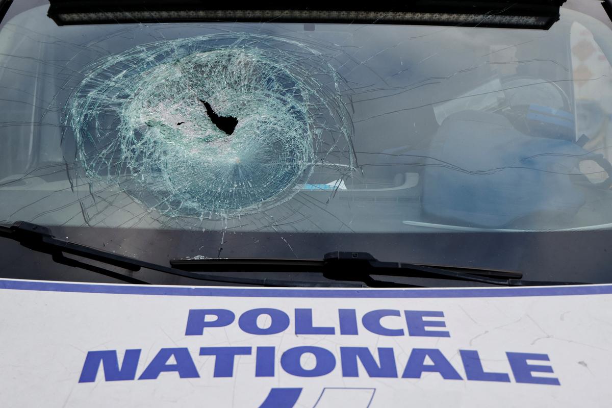 A view shows a police vehicle, damaged during recent riots, during a visit by French President Emmanuel Macron at the central police station in Noumea, France’s Pacific territory of New Caledonia on May 23, 2024. Photo: Via Reuters