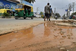 After no government response for a long time, labour colony residents in Kudremukh  repair road themselves - The Hindu