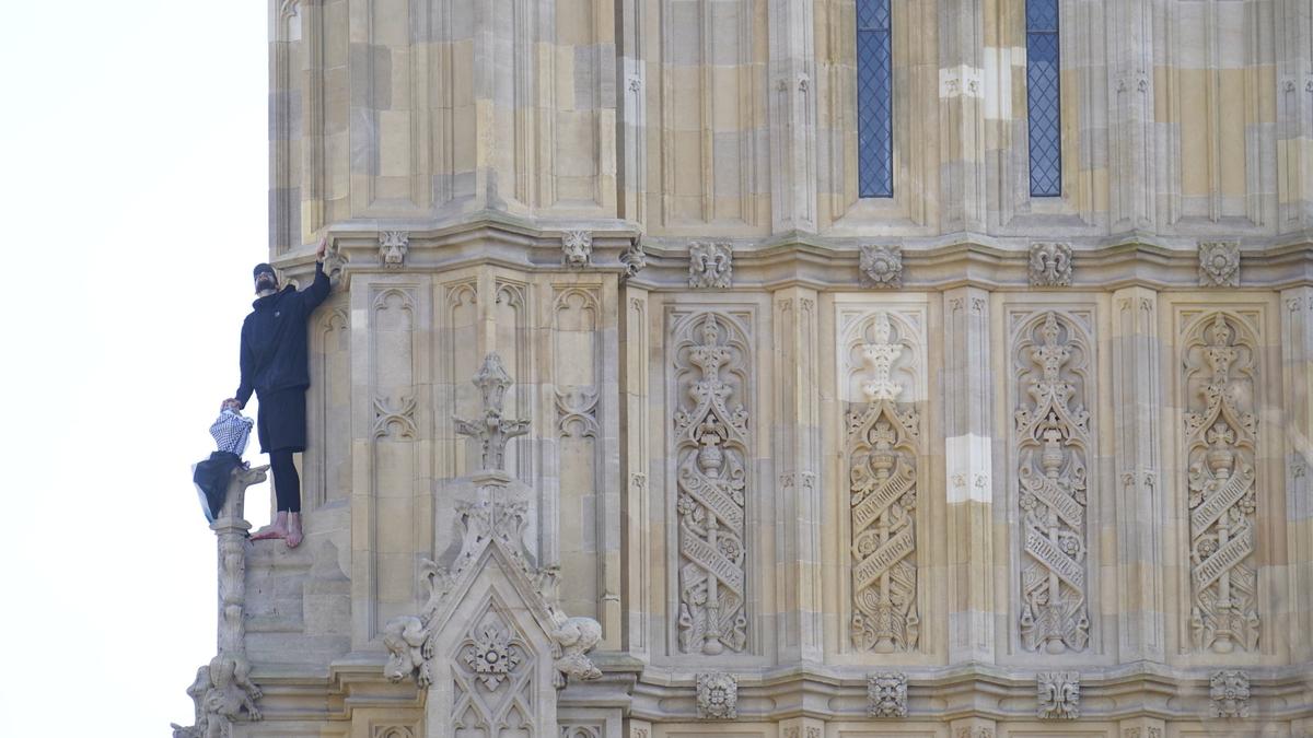 Emergency services respond after man with Palestinian flag climbs up Big Ben tower