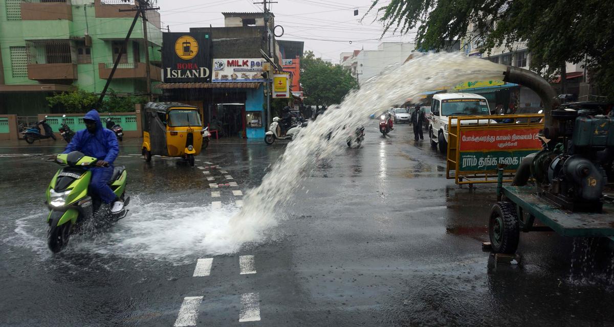 Civic authorities pumping water from 45 feet road in Puducherry on Tuesday, November 14, 2023