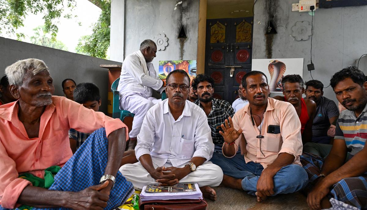 Up in arms: Farmers at Alanjeri say a proposed quarry that they are protesting against has fenced off land where a channel bringing water to the irrigation tank runs through. They used to grow three crops of paddy a year, but struggle to grow even one now.