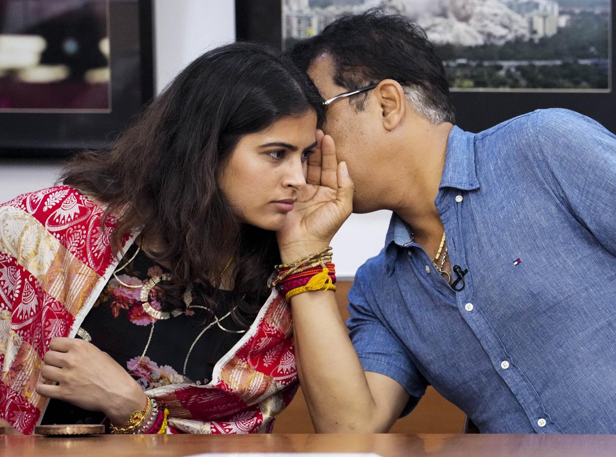 Paris Olympics Bronze medallist shooter Manu Bhaker with her personal coach Jaspal Rana during an interview with PTI, in New Delhi, on August 16, 2024.