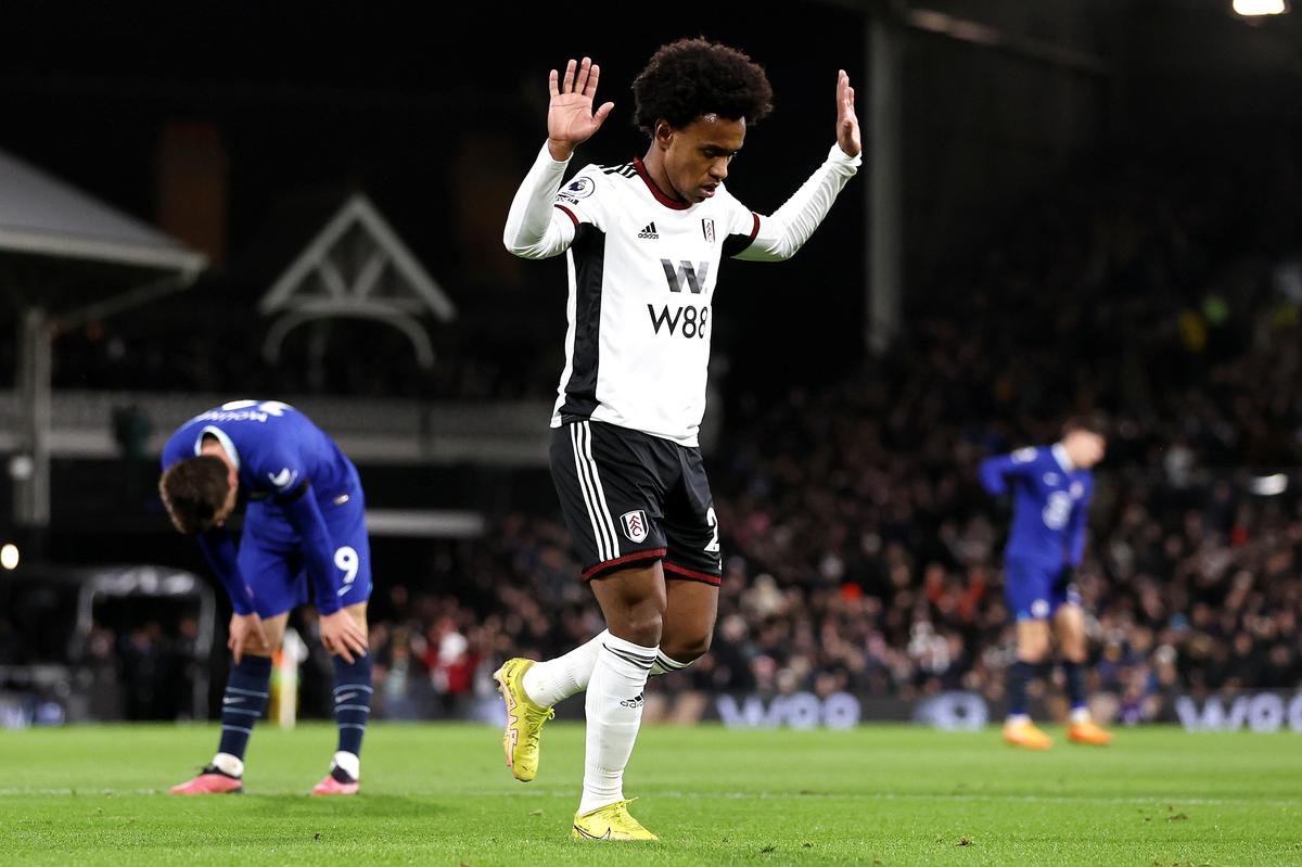 Willian of Fulham refuses to celebrate after scoring the first goal of the Premier League match between Fulham FC and Chelsea FC at Craven Cottage on January 12, 2023