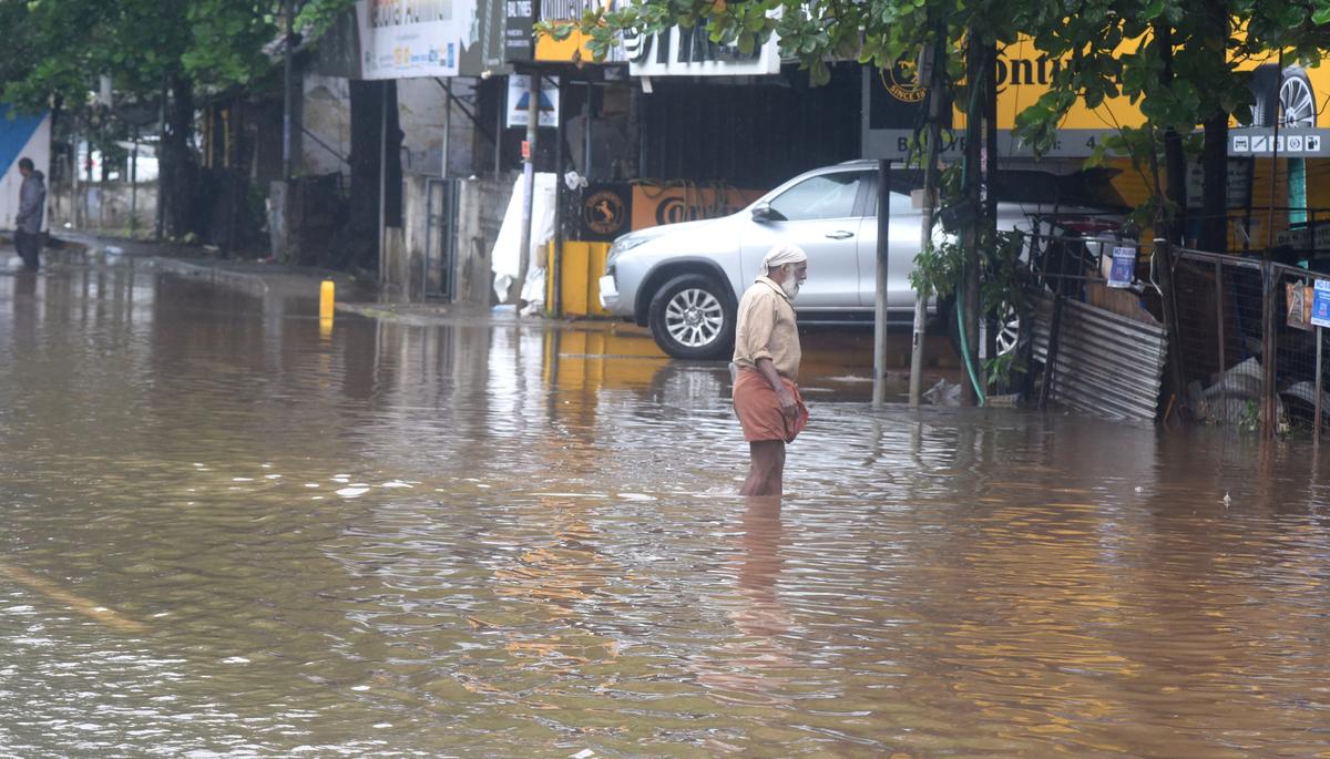 Mavoor Road at Parayancheri in central Kozhikode remains waterlogged following incessant rain on May 26.