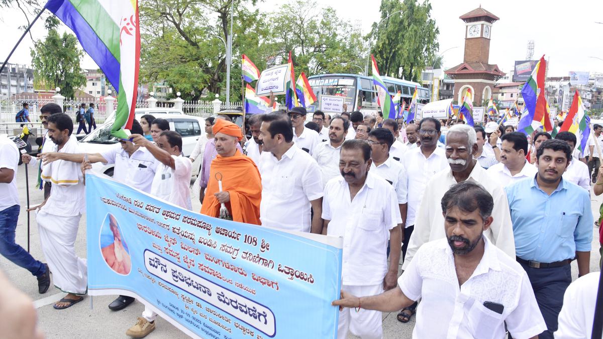 Jains take out silent protest march