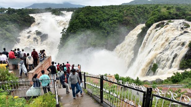 Tourists throng Gaganachukki waterfalls at Shivanasamudra