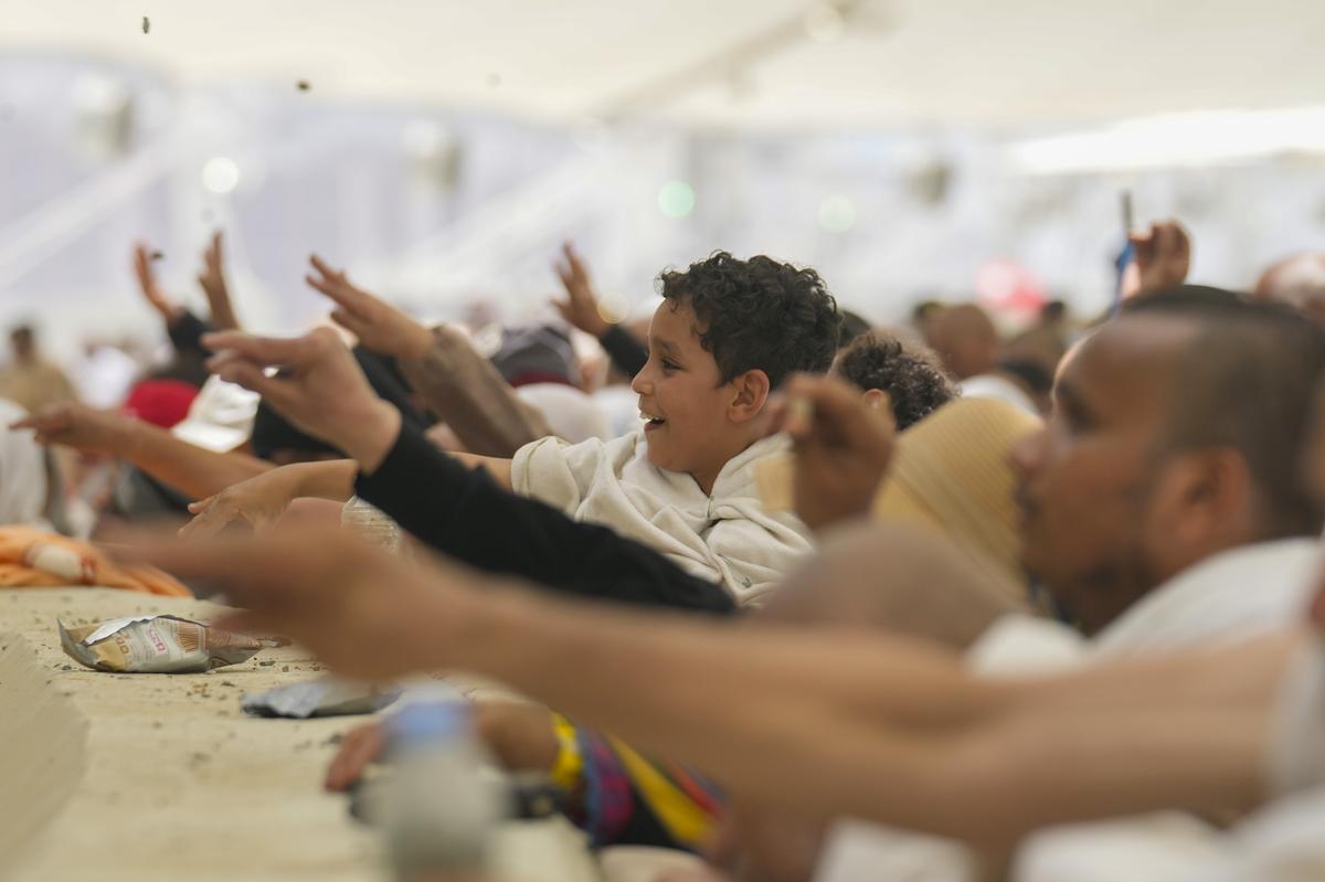 Muslim pilgrims cast stones at pillars in the symbolic stoning of the devil, the last rite of the annual hajj, in Mina, near the holy city of Mecca, Saudi Arabia, on June 16, 2024. 