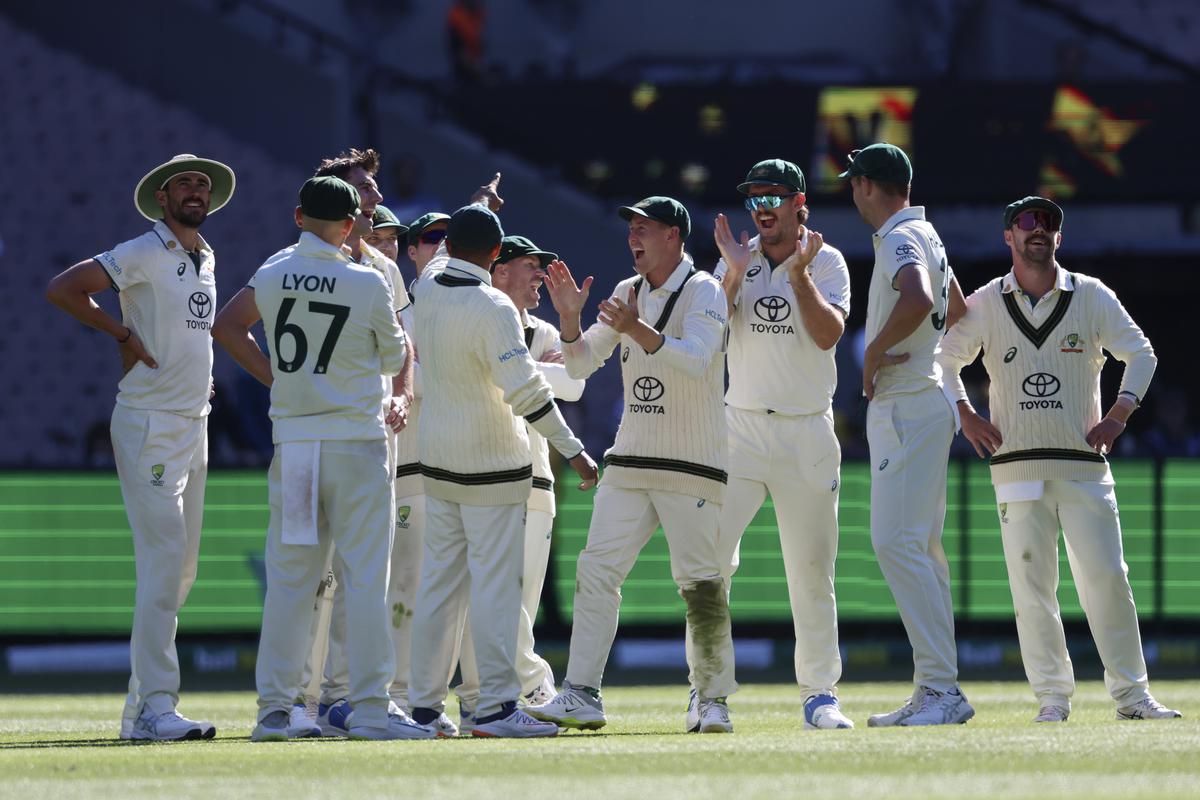 Australian players celebrate after dismissing a Pakistani batsman on day 4 of the second Test in Melbourne on December 29, 2023.