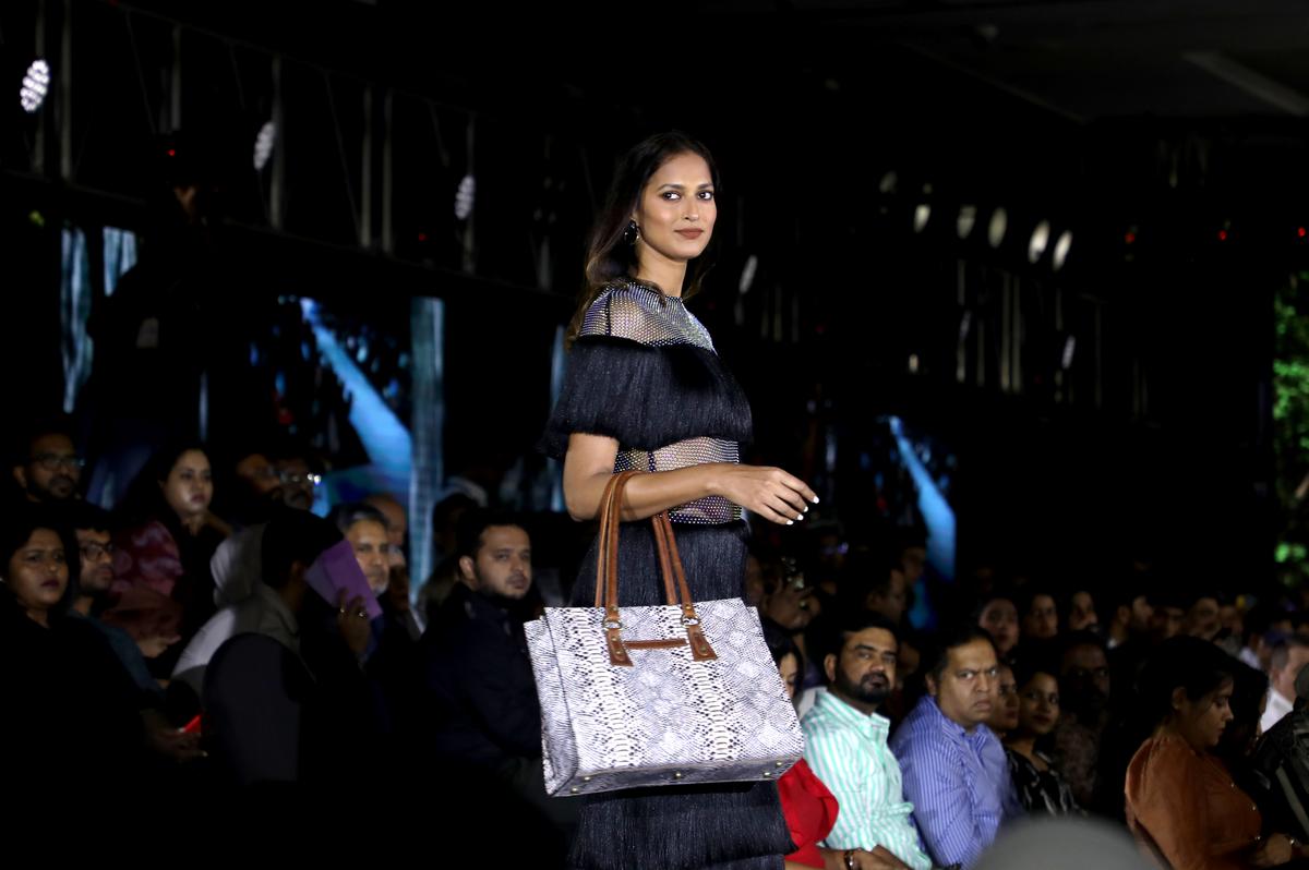 Model carrying a recycled bag by the Netherlands-based Solidaridad
