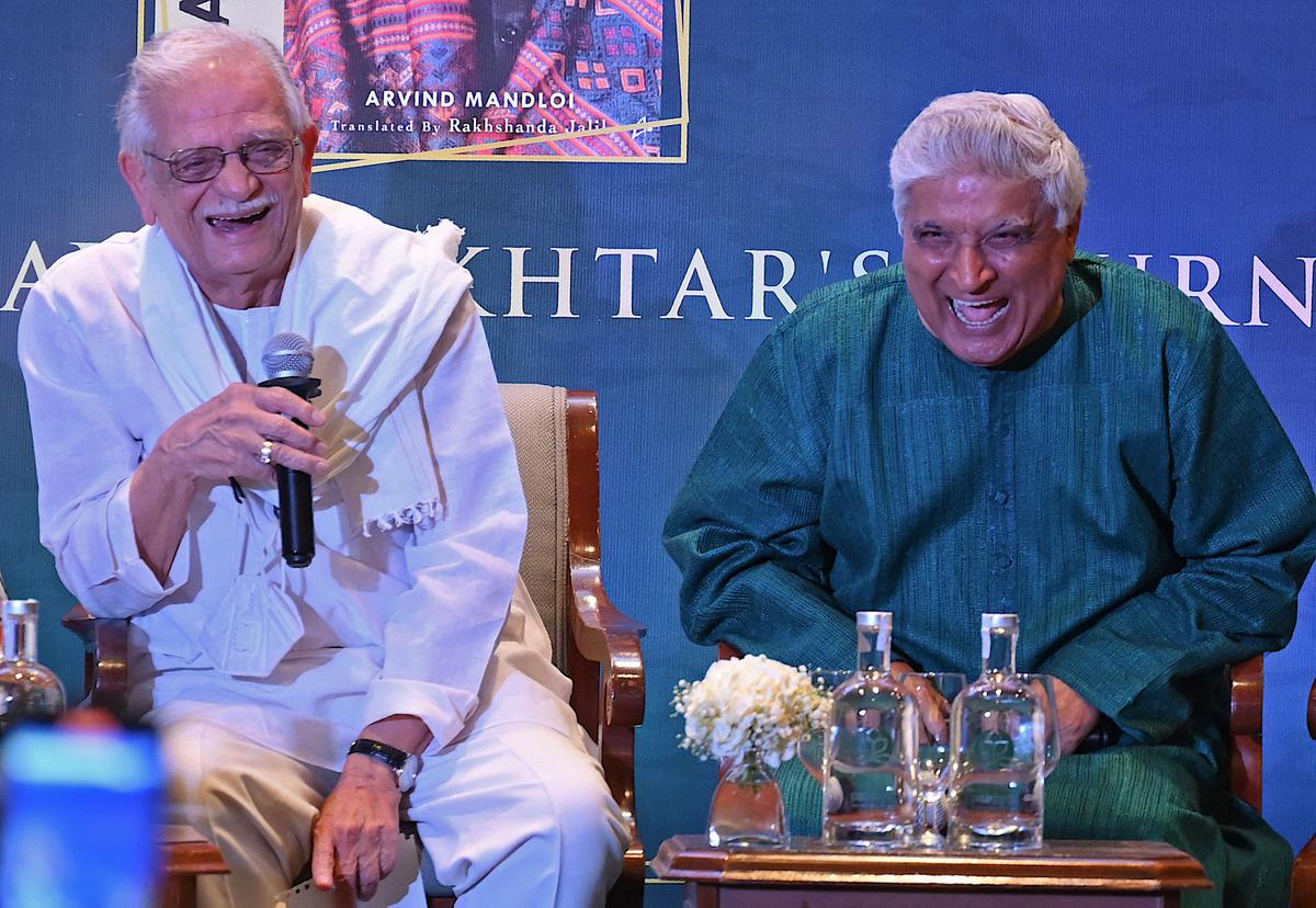 Gulzar (L) attends the book launch ceremony of the Indian poet, lyricist and screenwriter Javed Akhtar’s (R) journey titled ‘Jadunama’ in Mumbai