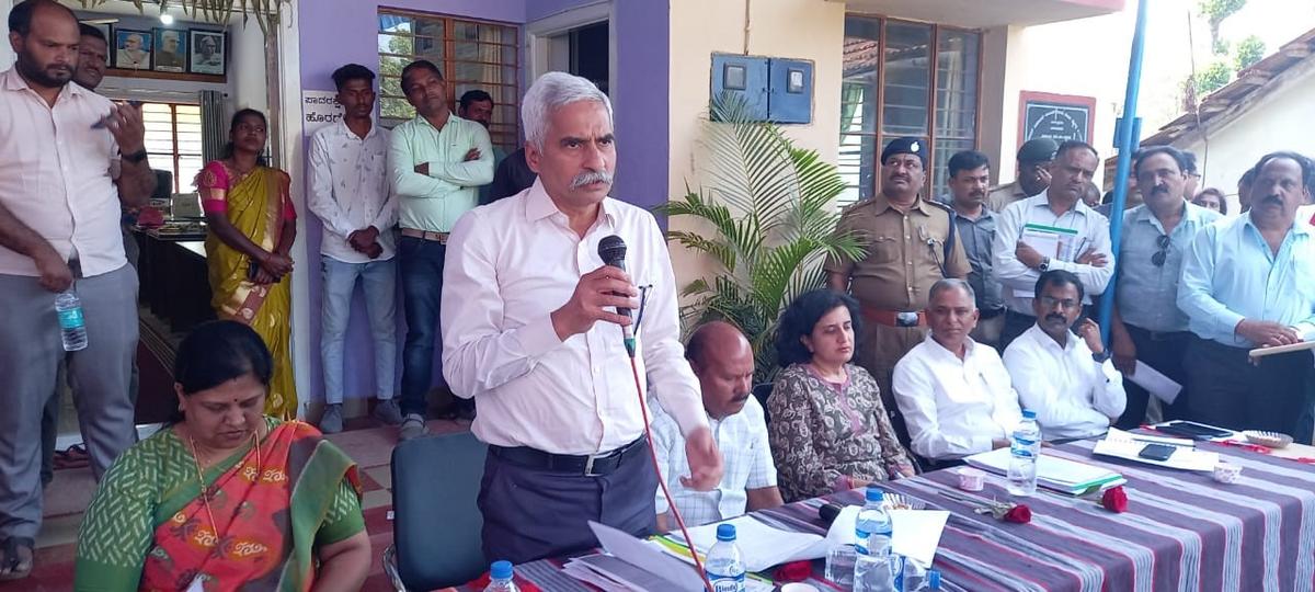 Man-elephant conflict study team interacts with public in Sakleshpur