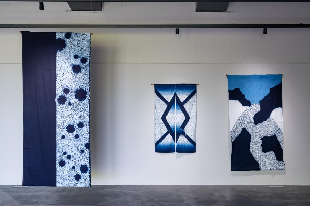 Tapestry by Takuma; (L-R) natural indigo with yatara miura shibori, and indigo on cotton with yatara miura shibori and boshi shibori