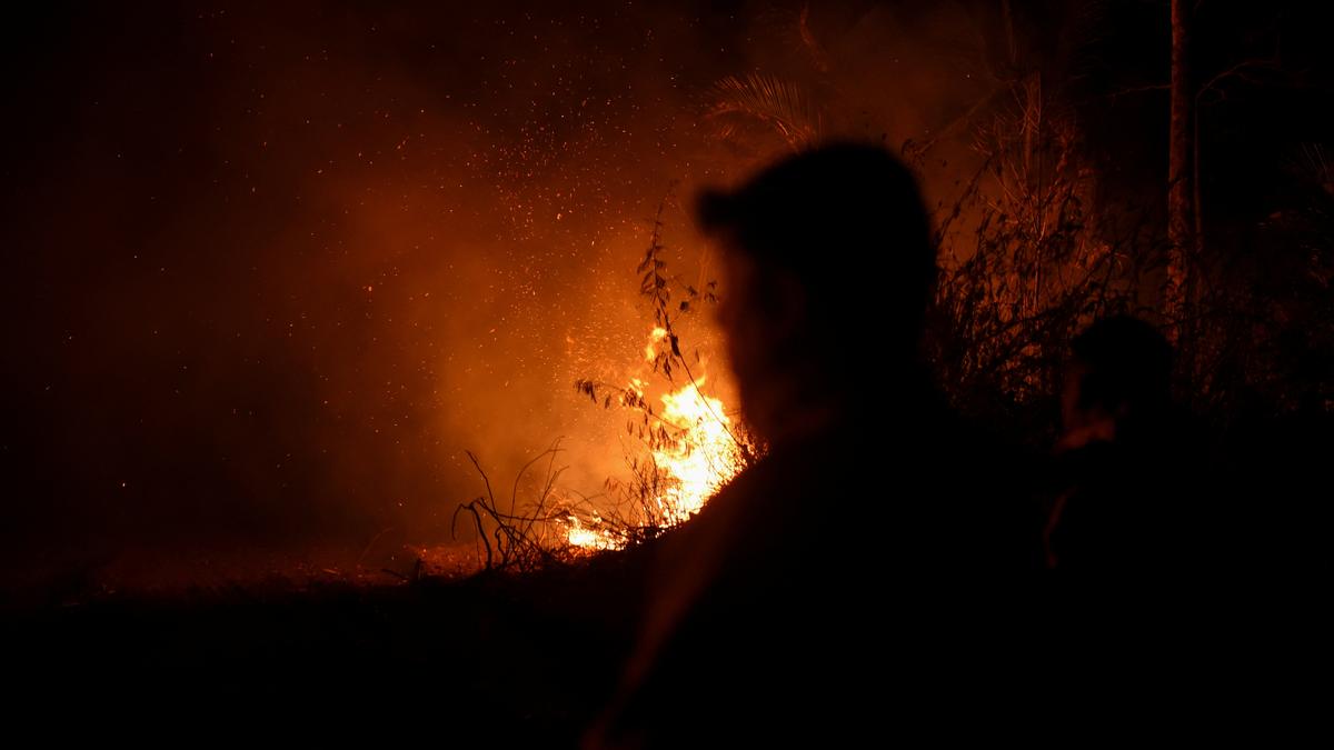 As Bolivia wildfires rage, smoke turns day into night