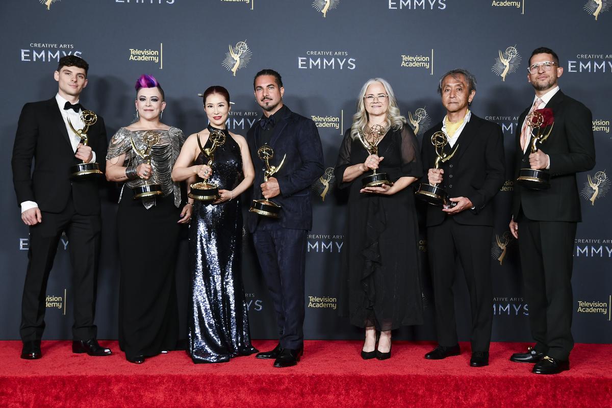 Michael Fontaine, from left, Crystal Jurado, Diana Choi, Mike Marino, Claire Flewin, Yoichi Art Sakamoto, and Bobby Diehl pose in the press room with the award for outstanding prosthetic makeup for “The Penguin” during night one of the Creative Arts Emmy Awards on Saturday, Sept. 6, 2025, in Los Angeles. Michael Fontaine, from left, Crystal Jurado, Diana Choi, Mike Marino, Claire Flewin, Yoichi Art Sakamoto, and Bobby Diehl pose in the press room with the award for outstanding prosthetic makeup for “The Penguin” during night one of the Creative Arts Emmy Awards on Saturday, Sept. 6, 2025, in Los Angeles.